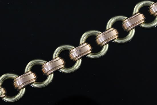 A mid 20th century Hungarian 14ct two colour gold circular link bracelet, 19cm.